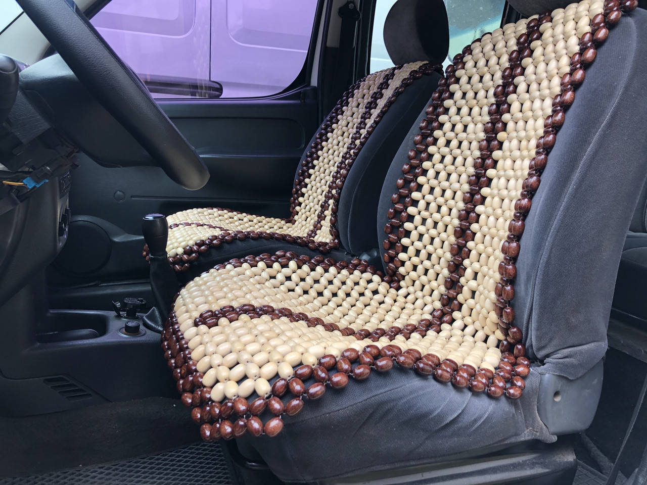 

Деревянная автомассажная накидка на сиденье автомобиля.