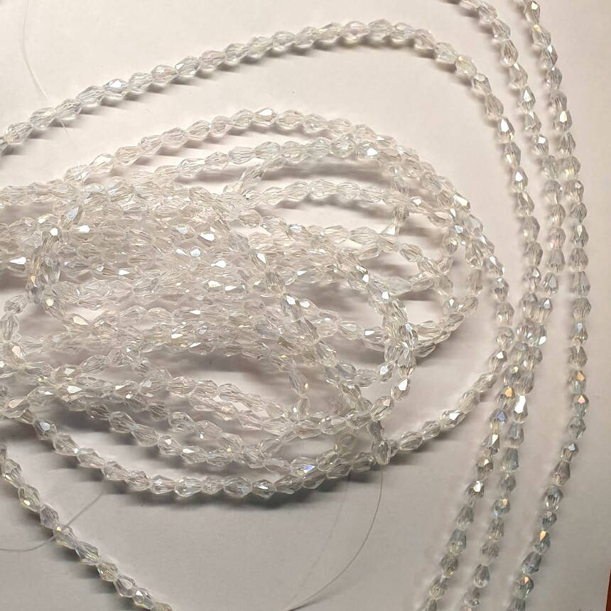 

4*6мм капля с гранями crystal_AB (Бусы стекло)