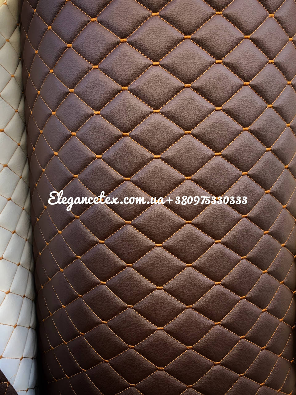 

Прошитый кожзам для автомобилей дублированный поролоном и синтепоном. «Ромб».Турецкого производства.