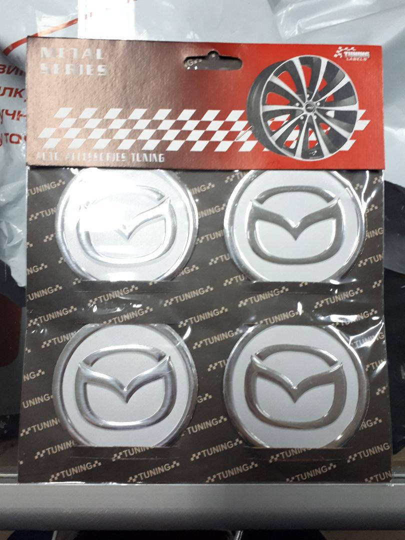 

Наклейки на колпачки, заглушки, наклейки на диски 60 мм Mazda Мазда хром, Черный