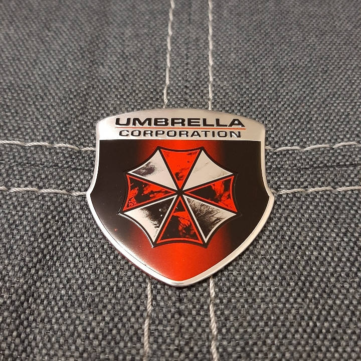 

Наклейка/Шильдик/Емблема Umbrella Corporation 55×50 мм.