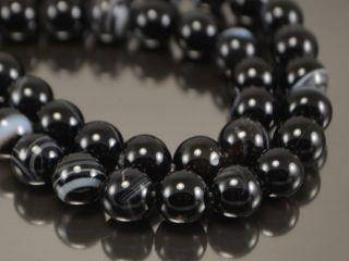 

Агат глазковый черный 8мм, круглый 1шт