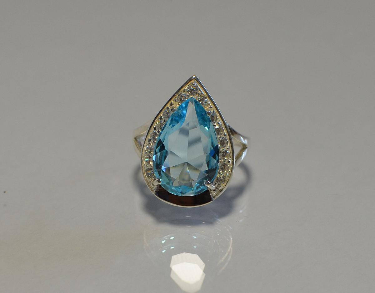 

Серебряное кольцо с пластинами из золота 038к 21