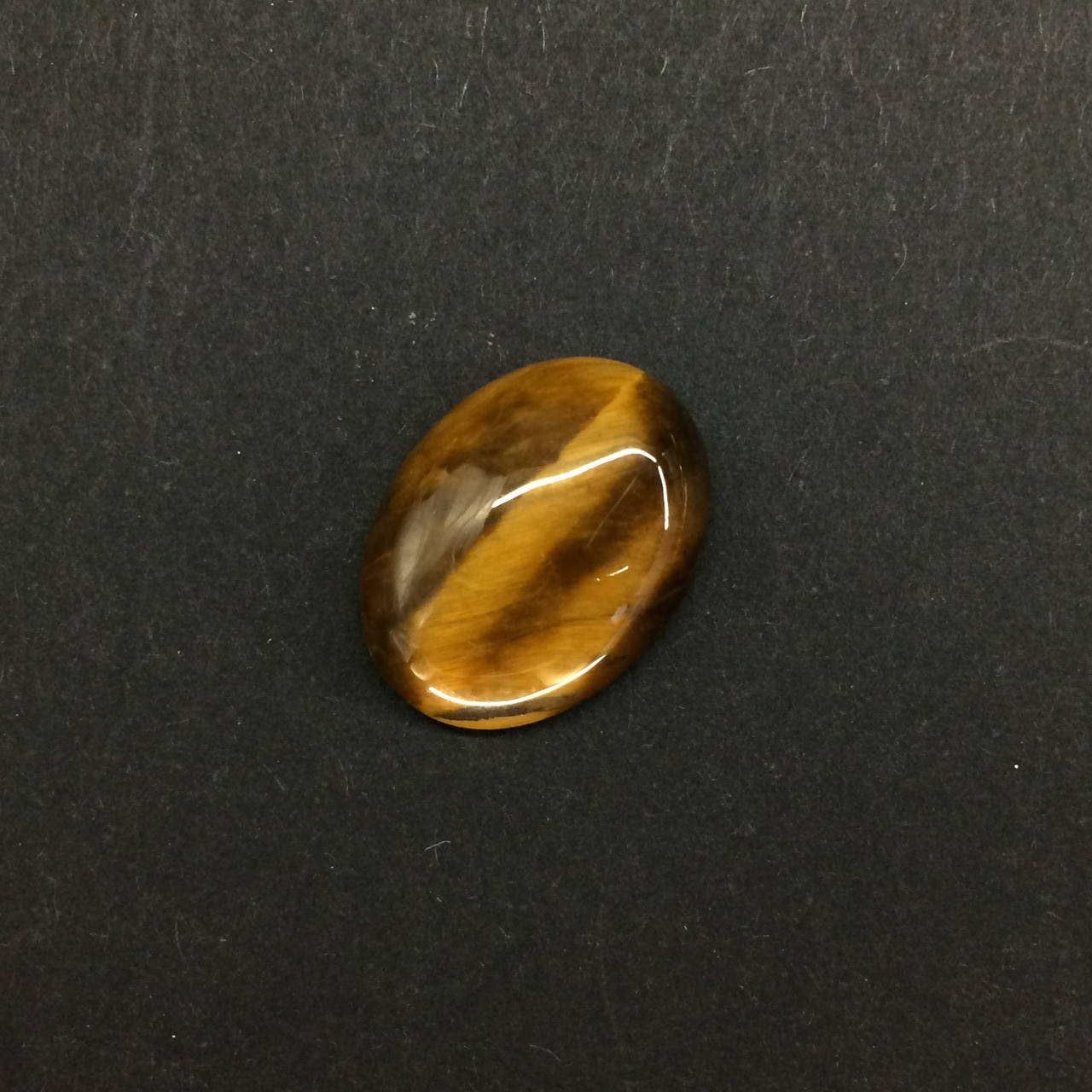 

Кабошон из натурального камня Тигровый Глаз 15*20мм