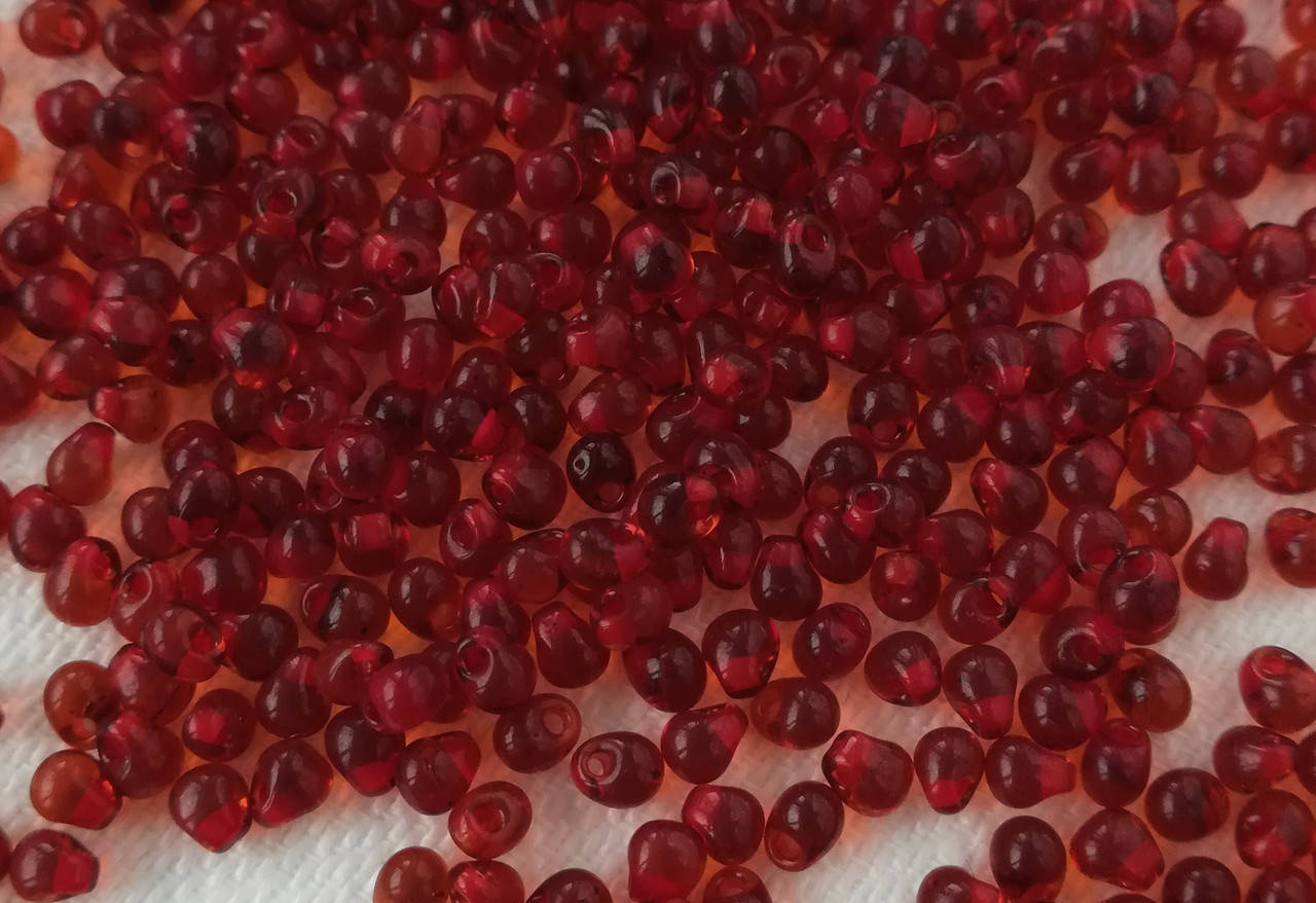

Miyuki Drops 3,4 mm Red Lined Dk.Topaz 5 г.