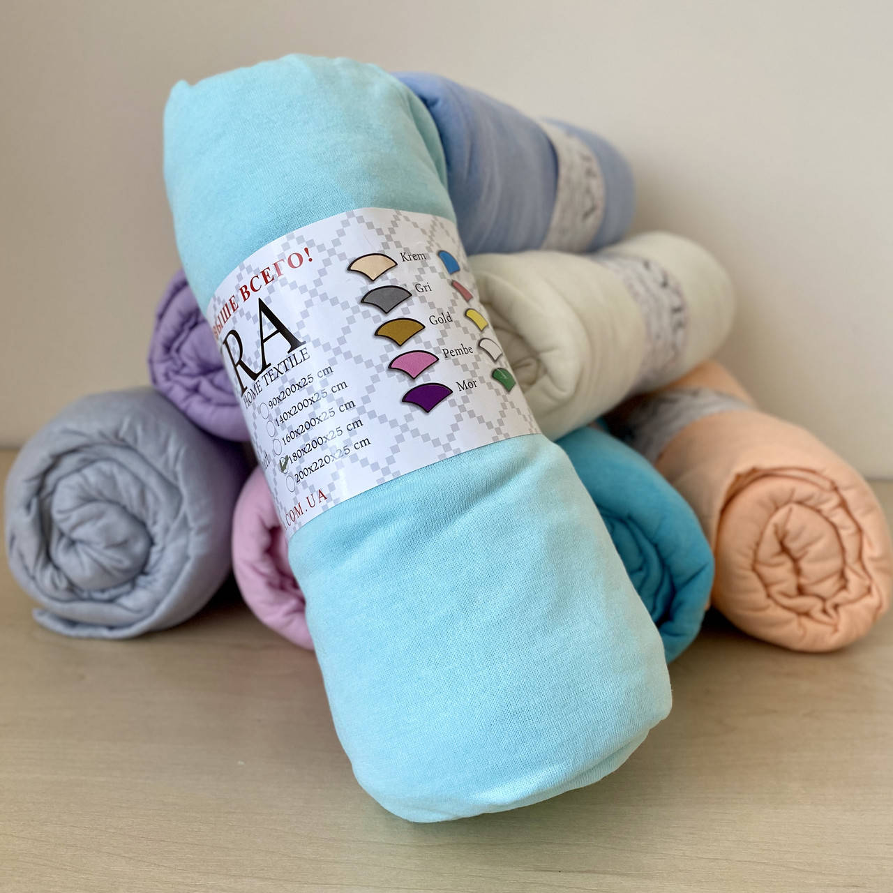 

Простыня на резинке трикотажная 180*200+25см. Наматрасник на резинке Цвет - Бирюзовый