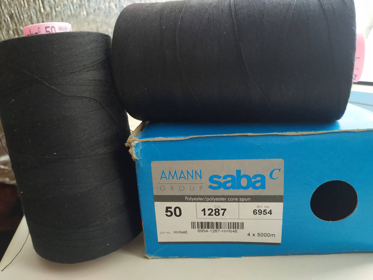 

Нитки армир. AMANN Saba C №50 5000м (цв1287) черно-серые, Серый