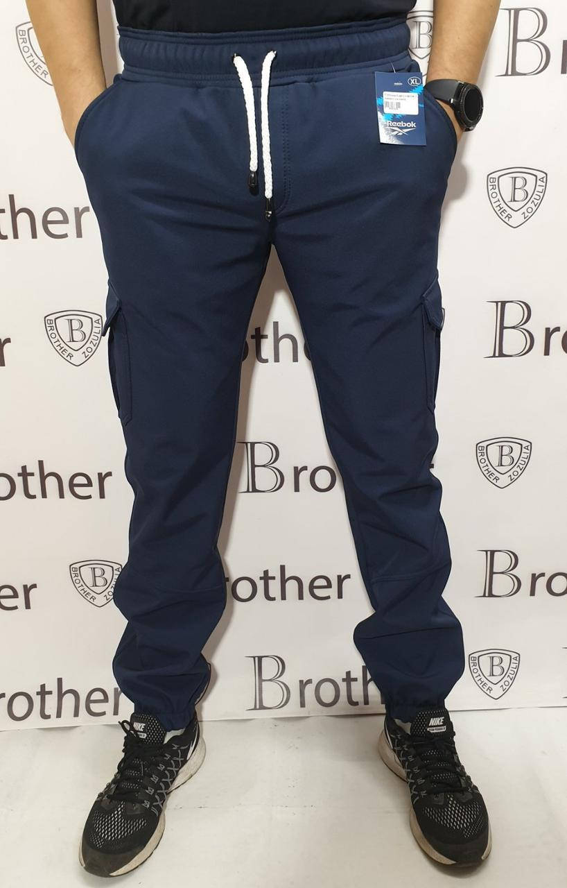 

Спортивные штаны с мембранной ткани Soft SHELL Рибок Синие, Синий