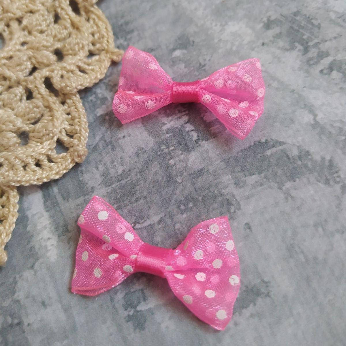 

Бантик 35мм рожевий в горошок