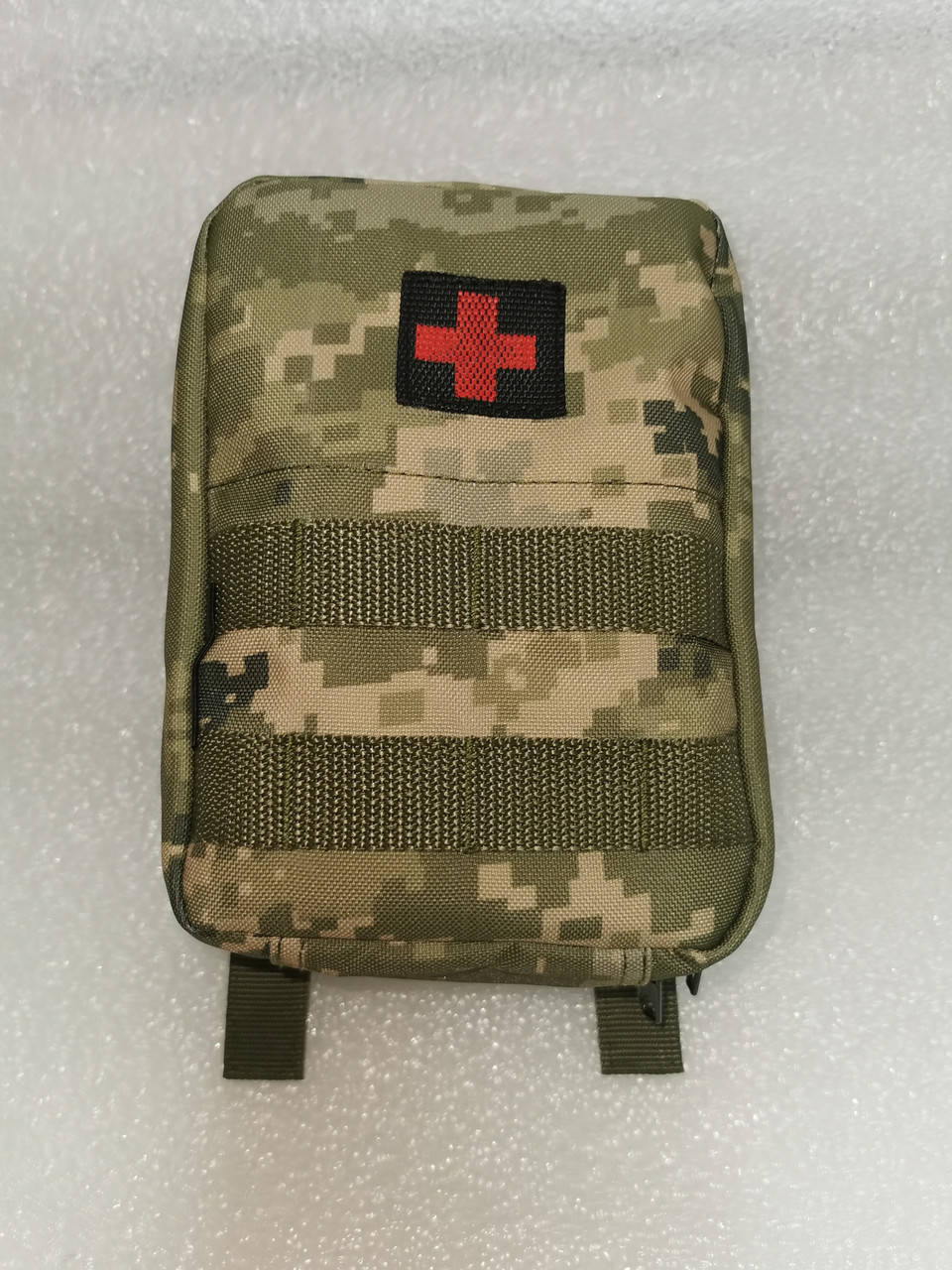 

Аптечка тактическая с быстрым сбросом пиксель М14