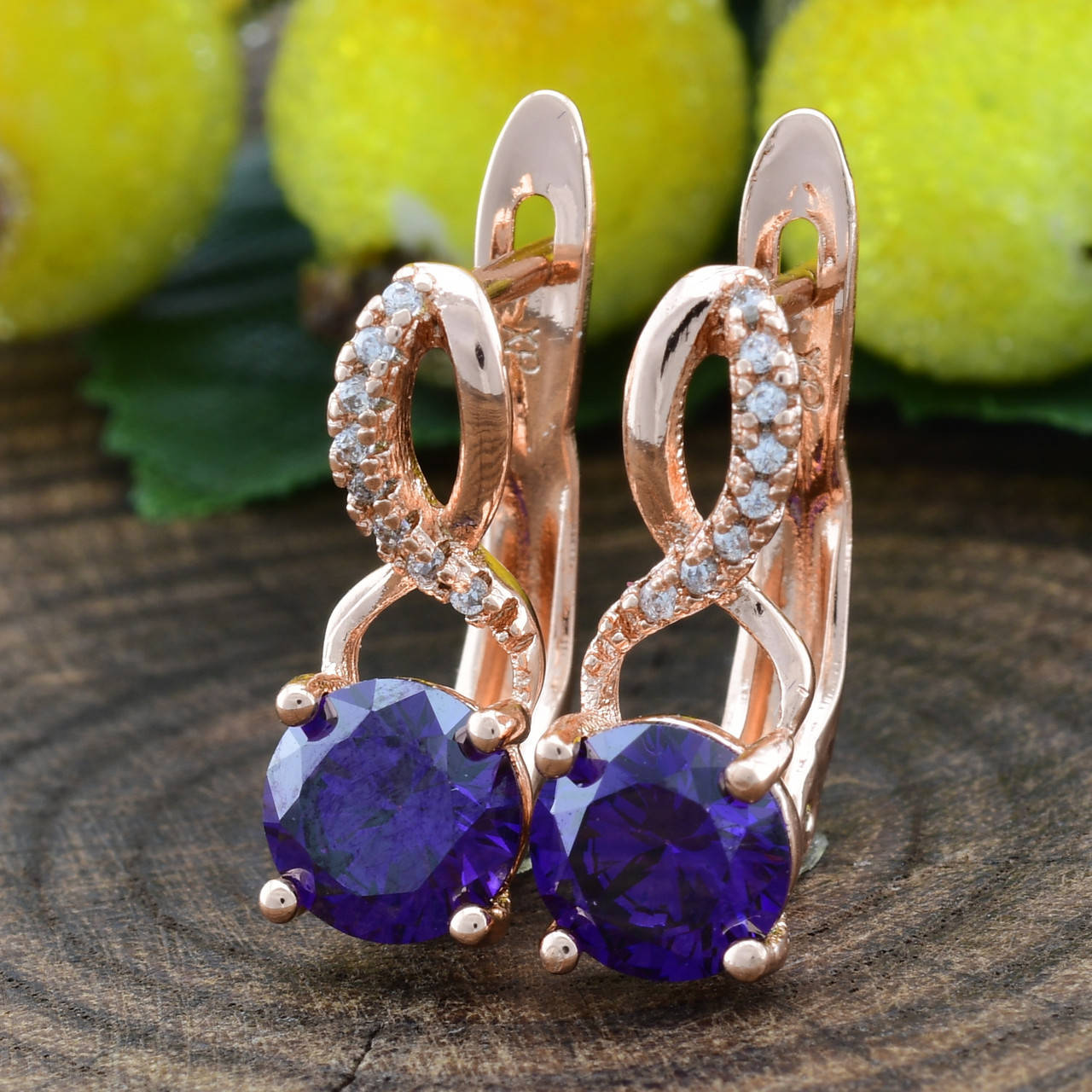 

Серьги Xuping 21240 размер 16х6 мм фиолетовые фианиты вес 2.50г позолота РО