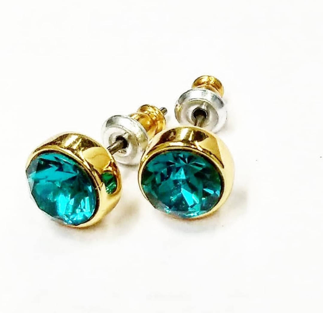 

Сережки пусеты Karpinski з бирюзовыми кристаллами swarovski в золотистом цвете