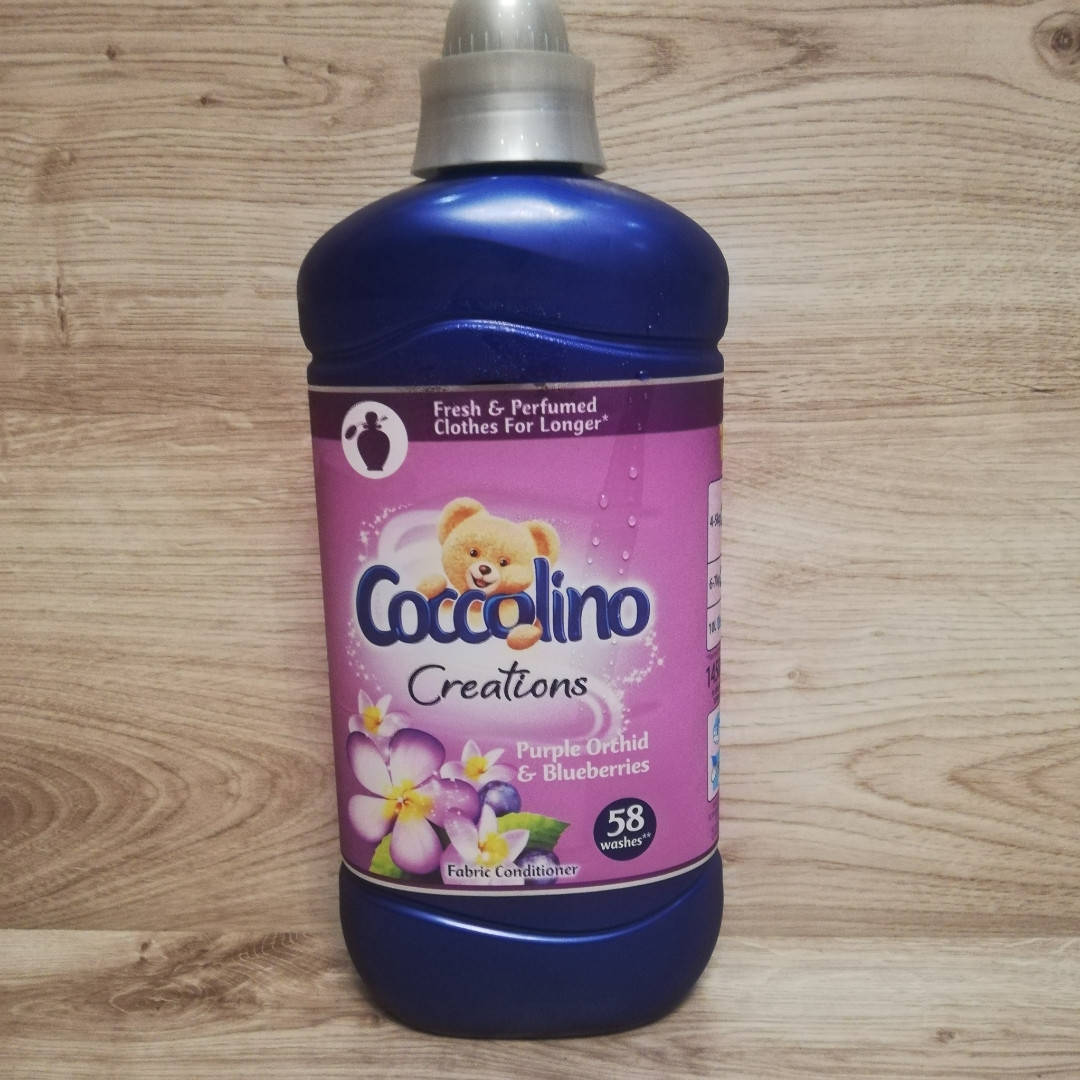 

Парфумированый кондиционер для белья с ароматом Орхидеи и Черники Coccolino 1,45 л 58 ст концентрат