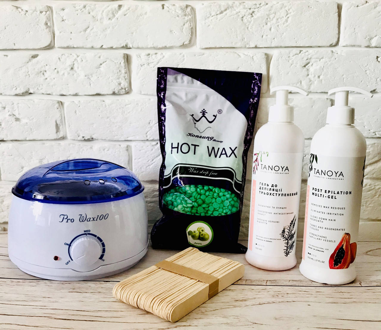 

Набор для депиляции в домашних условиях воском пленочным Konsung beauty 500 г с мультигелем Tanoya 500 мл