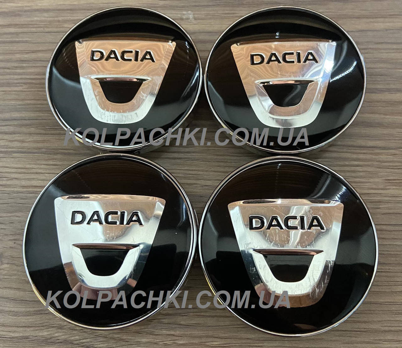 

Колпачки Dacia черные/хром (63мм*61 мм )