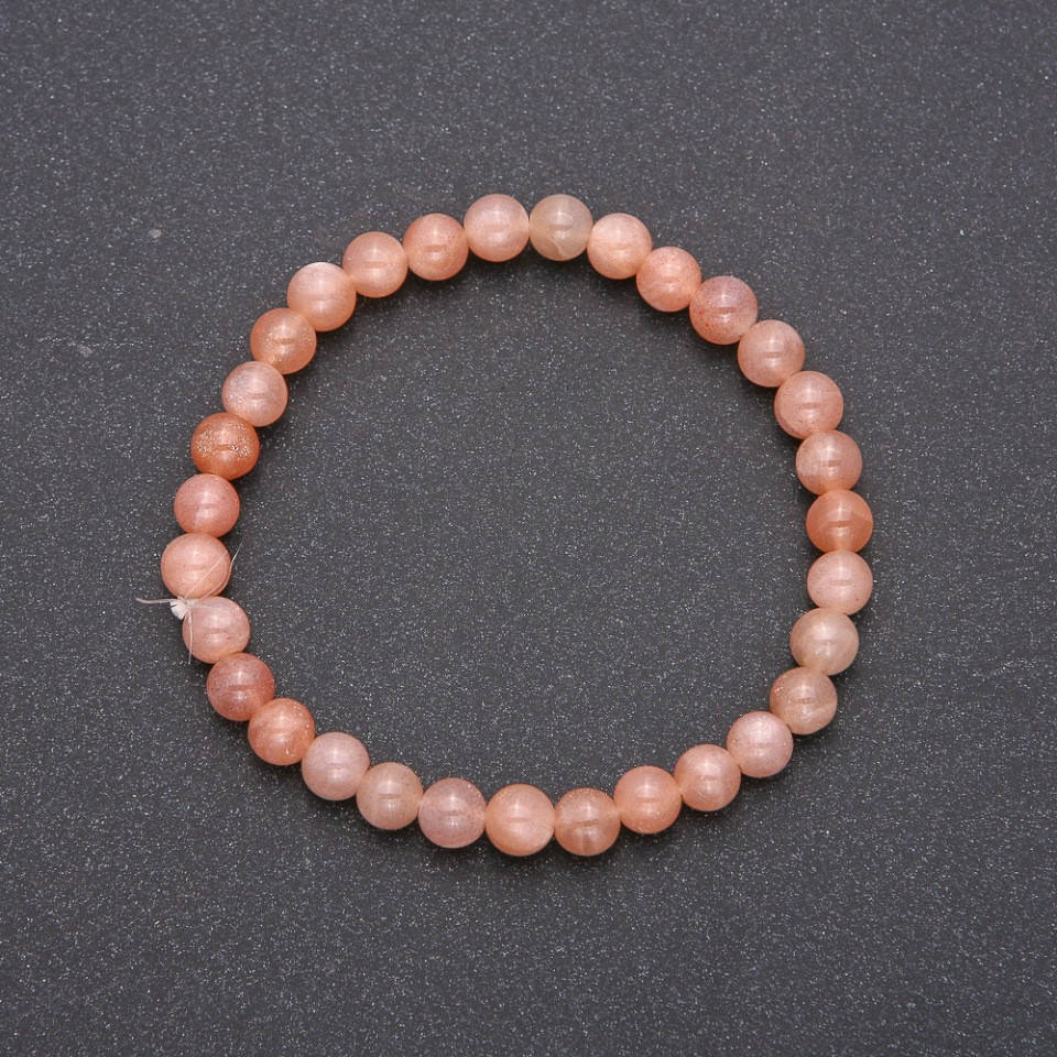 

Браслет из натурального камня Селенит на резинке гладкий шарик d-6(+-)мм обхват 18см