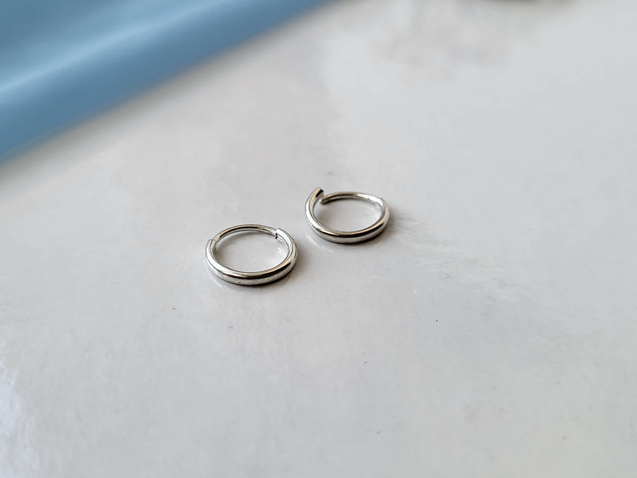 

Серебряные сережки кольца 10 мм 1 штука