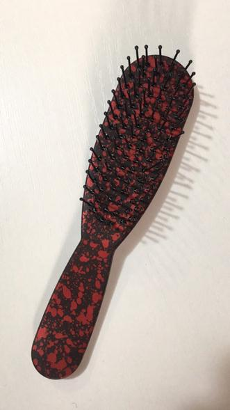 

Расческа пятнистая на толстой ручке