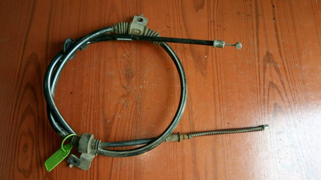 

Трос ручника левый 4820A049 (81416737) Lancer X Mitsubishi