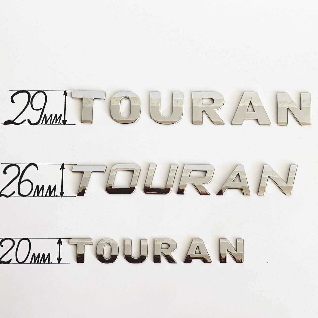 

Буквы TOURAN