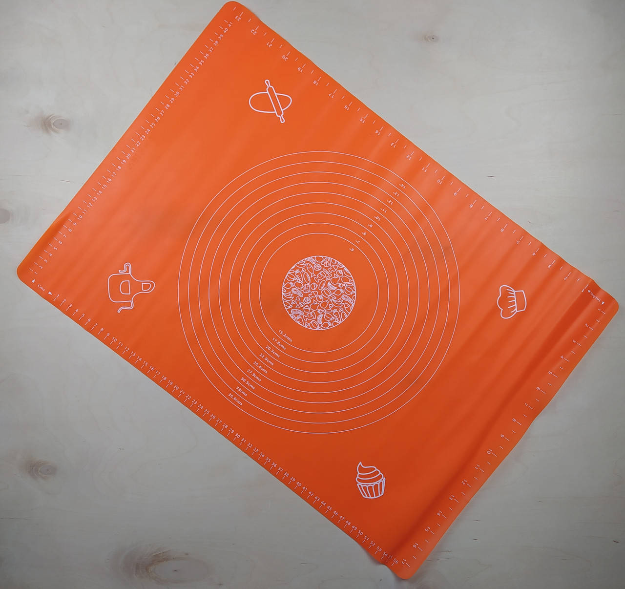 

Силиконовый коврик для раскатывания теста 63 см * 66 см.