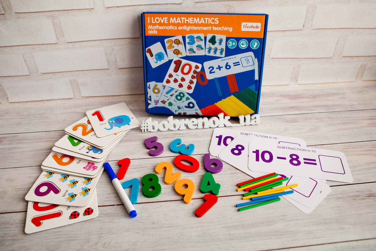 

Деревянная Математика деревянные цифры, карточки с уравнениями, счетные палочки, цифры, маркер, в коробке