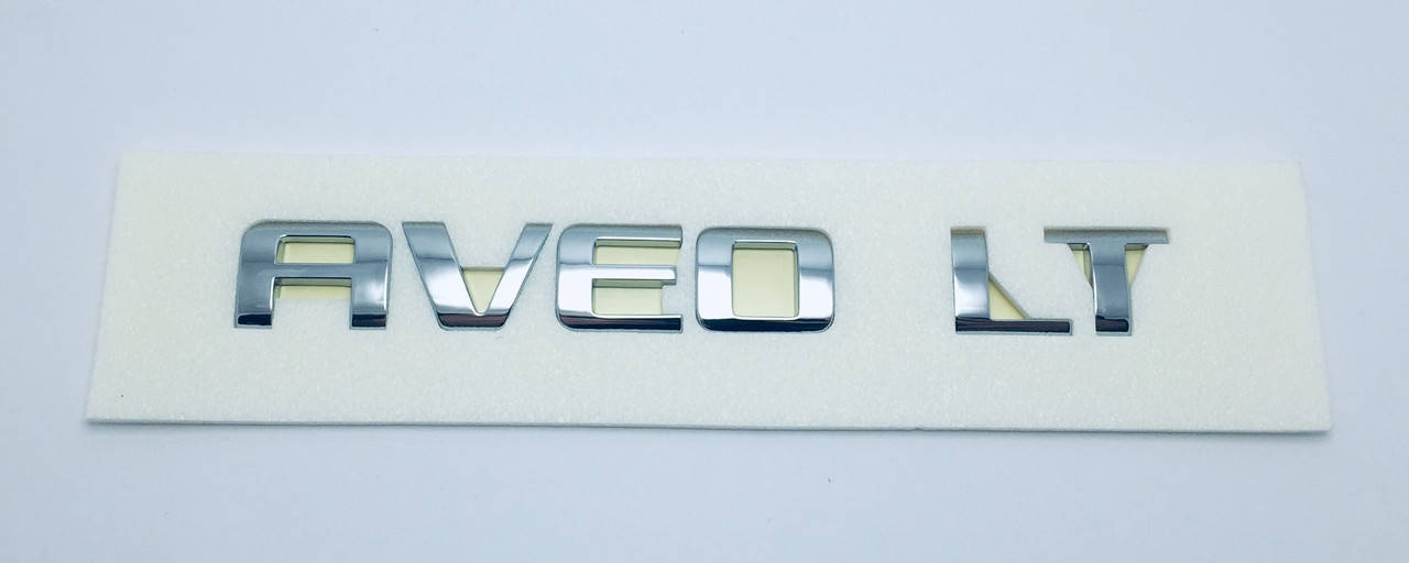 

Эмблема надпись багажника Chevrolet Aveo LT оригинал
