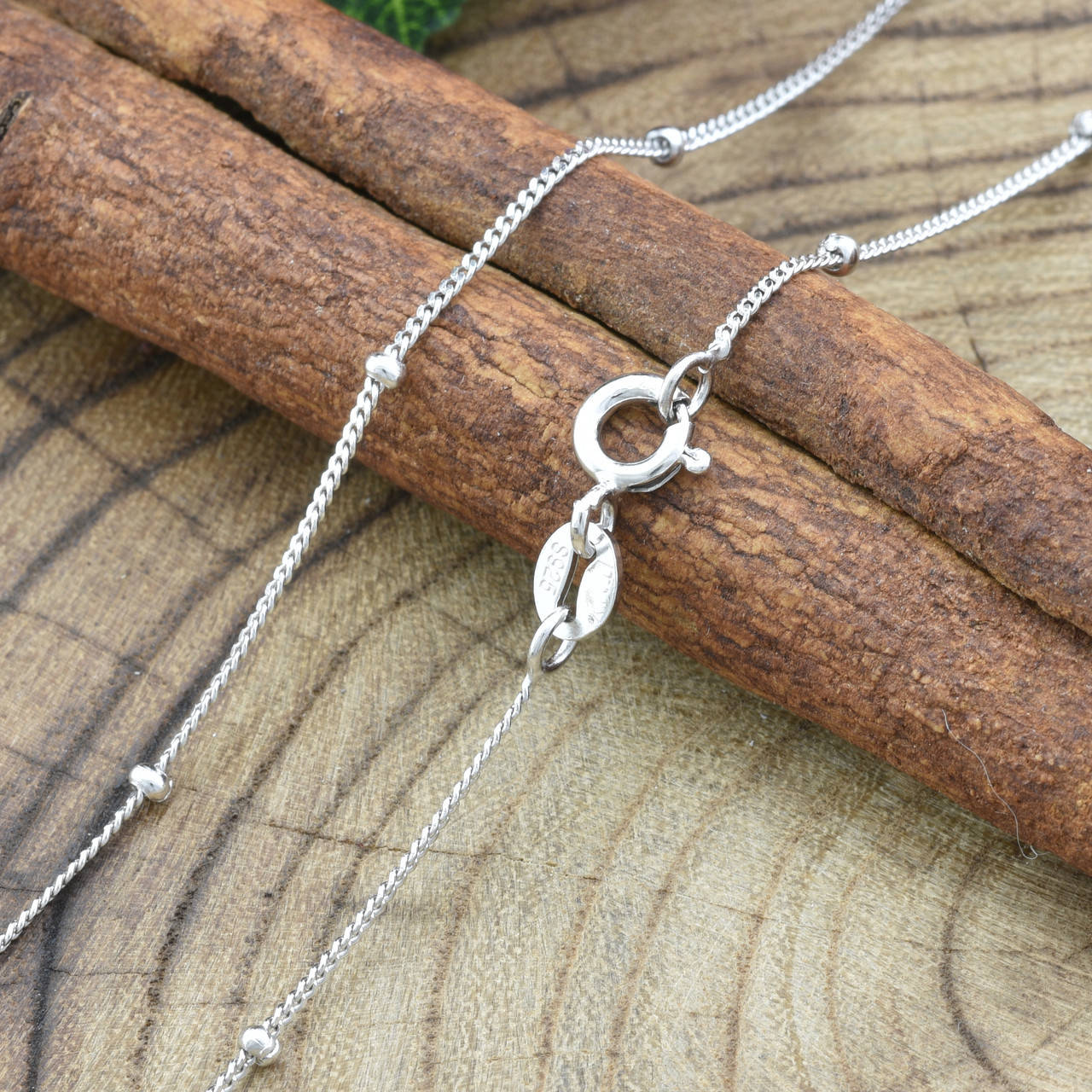 

Серебряная цепочка с бусинками ширина 1 мм ТС5300221 длина 40