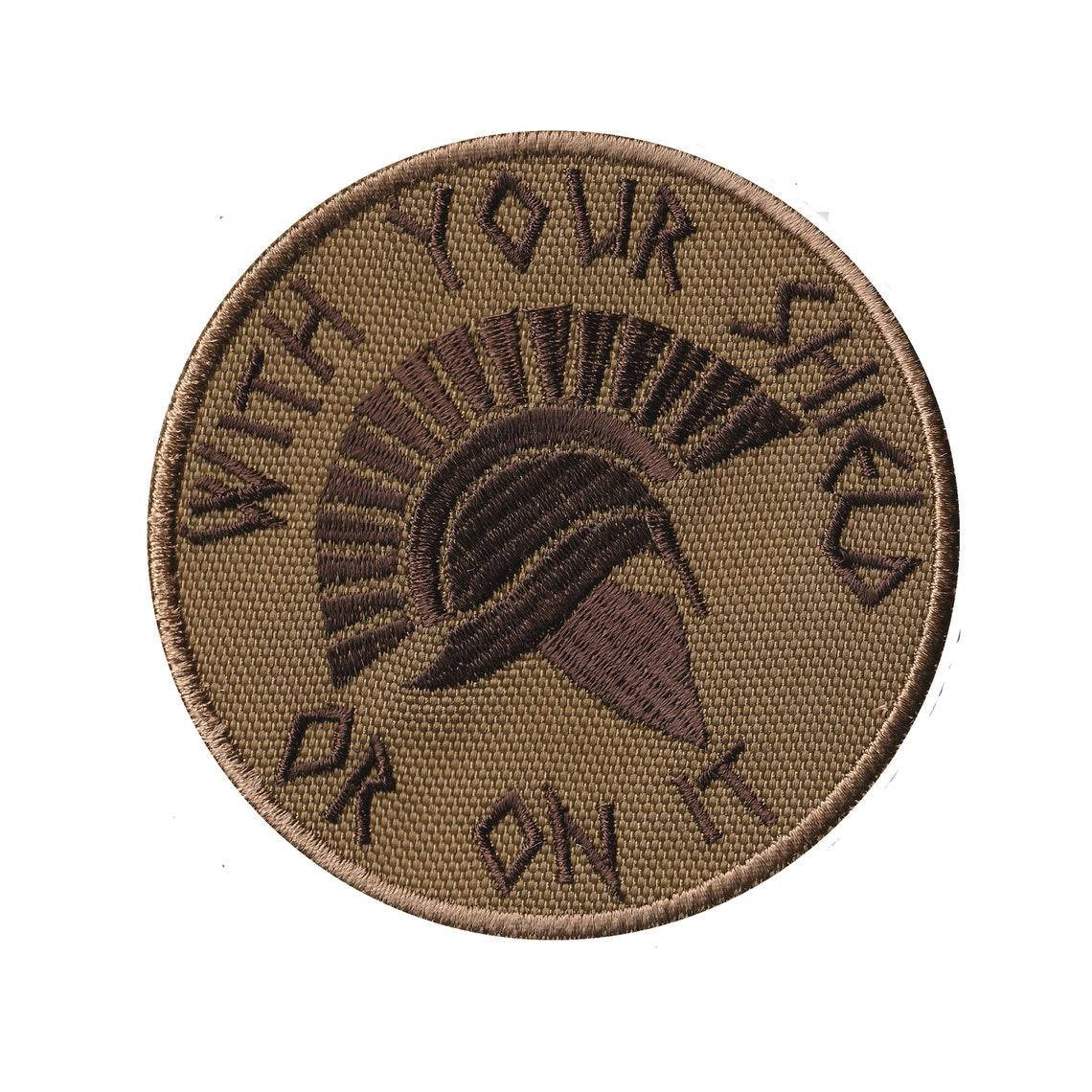 

Шеврон, нашивка, патч "With Your Shield Or On It" Койот коричневий