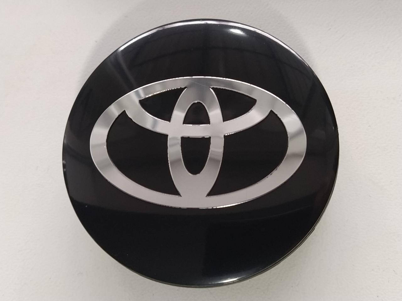 

Колпачки заглушки в литые диски Toyota 57/53/9 мм. Черная