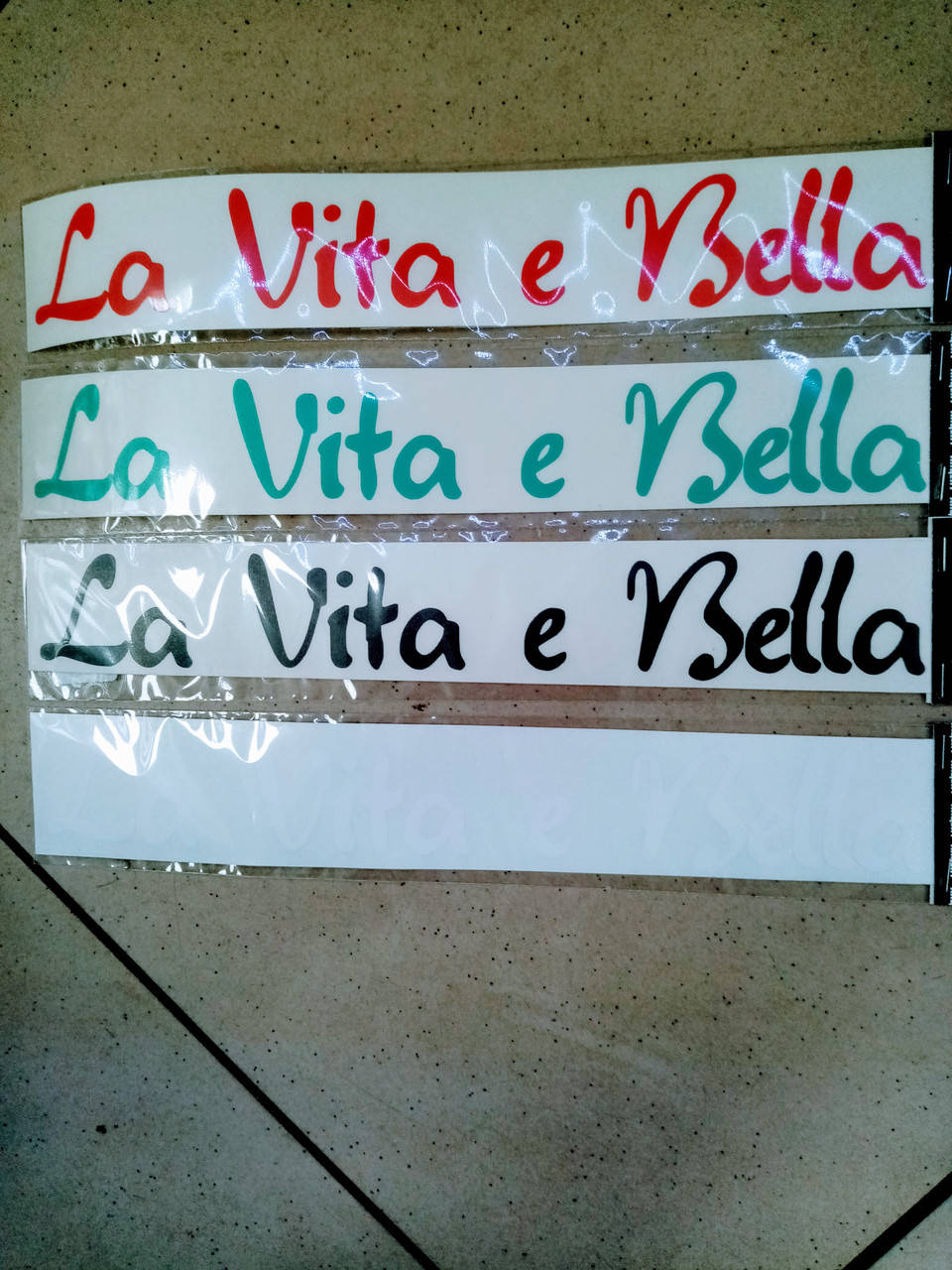 

Виниловые наклейки La Vita e Bella (Жизнь Прекрасна) 4 цвета 24х3,5 см