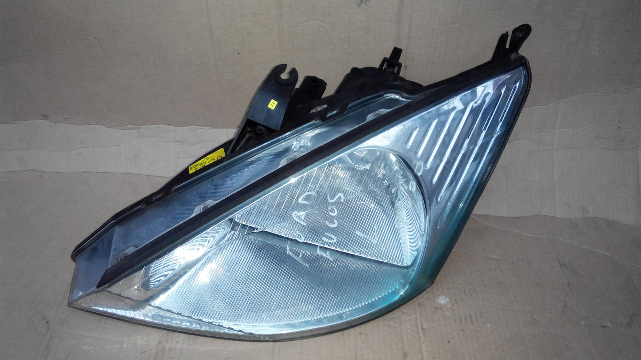 

Фара основная левая для Ford Focus 1, (1998-2001) Hella XS4X13006