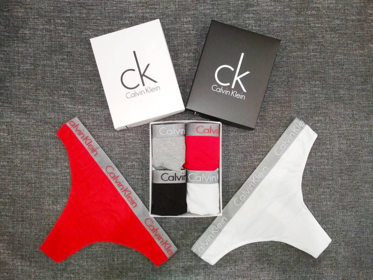 

Женское нижнее бельё, стринги Calvin Klein набор из 4 шт в подарочной коробке