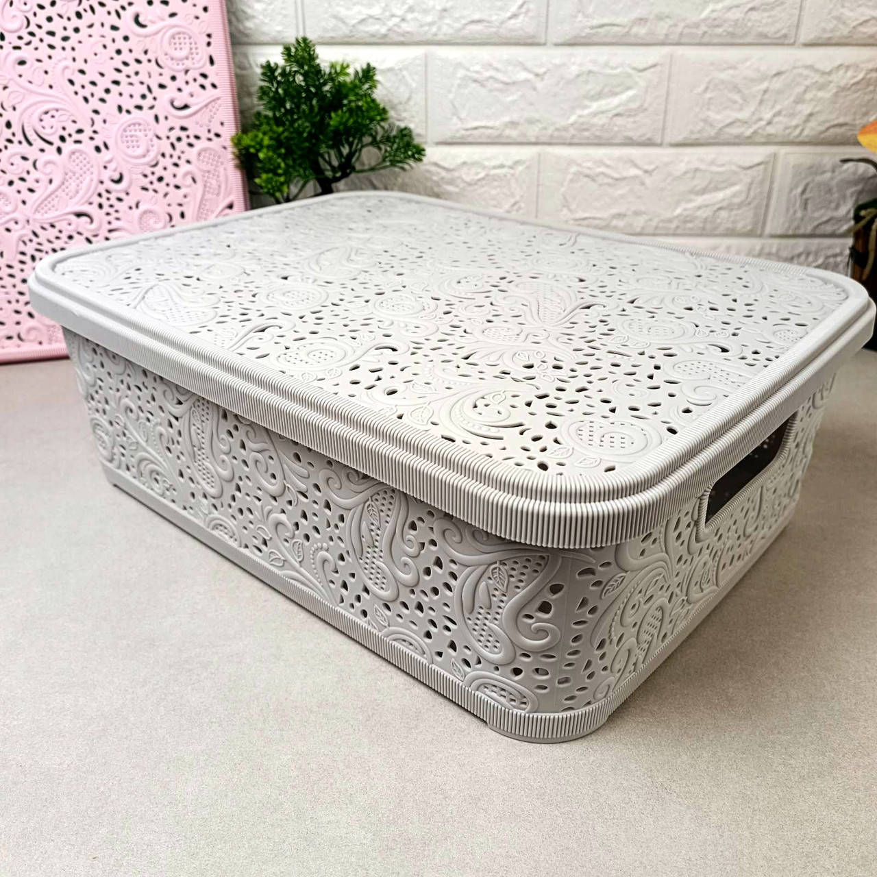 

Серый прямоугольный контейнер для хранения вещей 12л