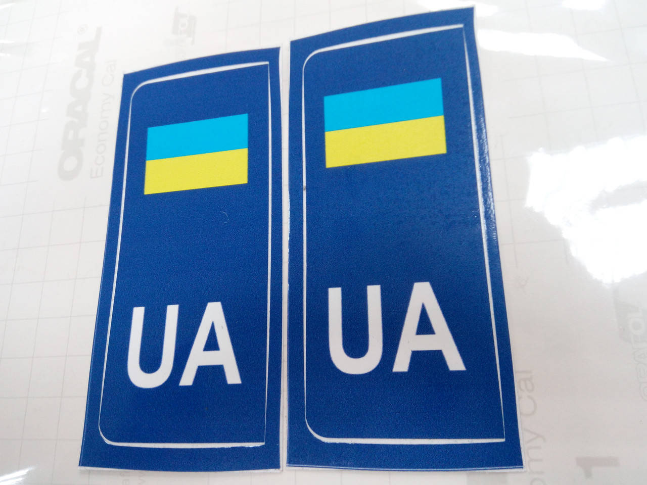 

Виниловая наклейка на номерной знак UA 10х4 см