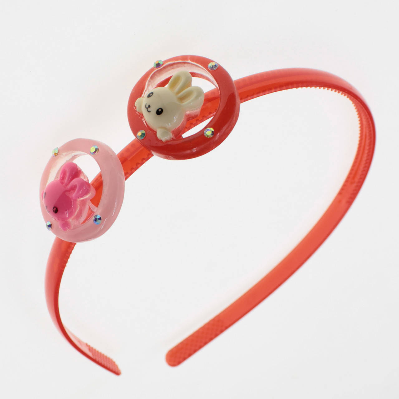 

Обруч для волос детский оранжево-розового цвета с двумя разноцветными зайчиками