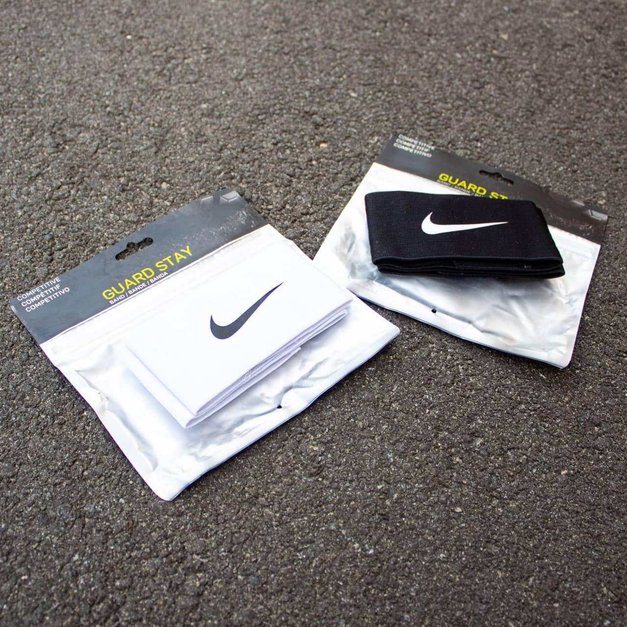 

Тримач для щитків Nike GUARD STAY чорний колір тейпи для щитків