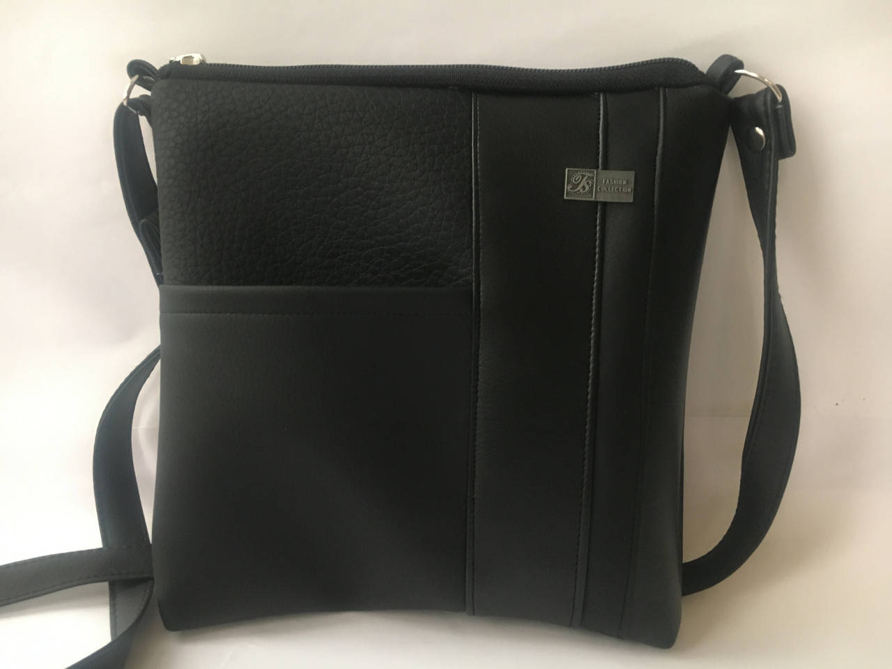 

Чёрная женская сумочка кроссбоди