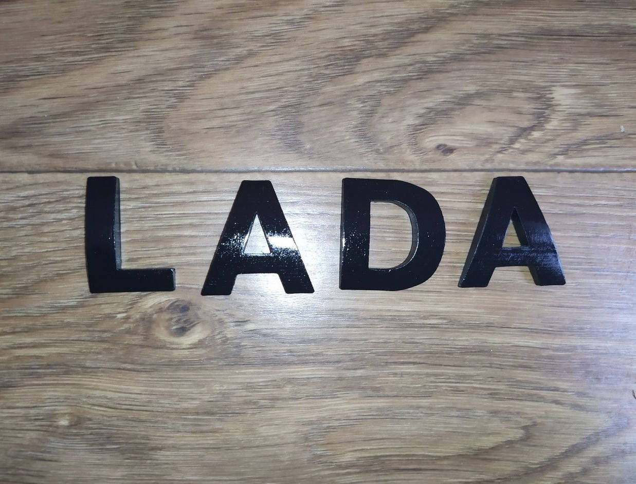 

Надпись LADA (ЛАДА)