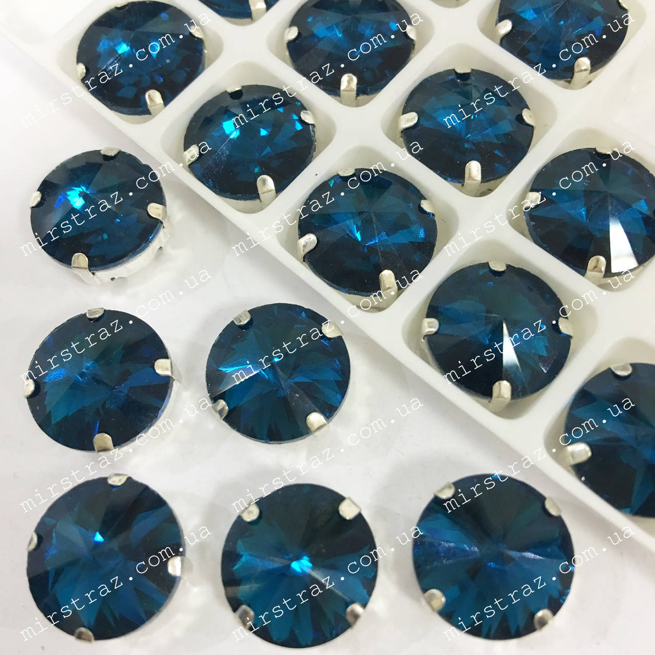 

Пришивные стразы в цапах 14мм, цвет Blue Zircon, Индиго