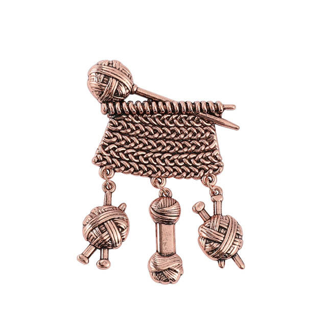 

Брошь «Вязание со спицей, клубки шерсти».