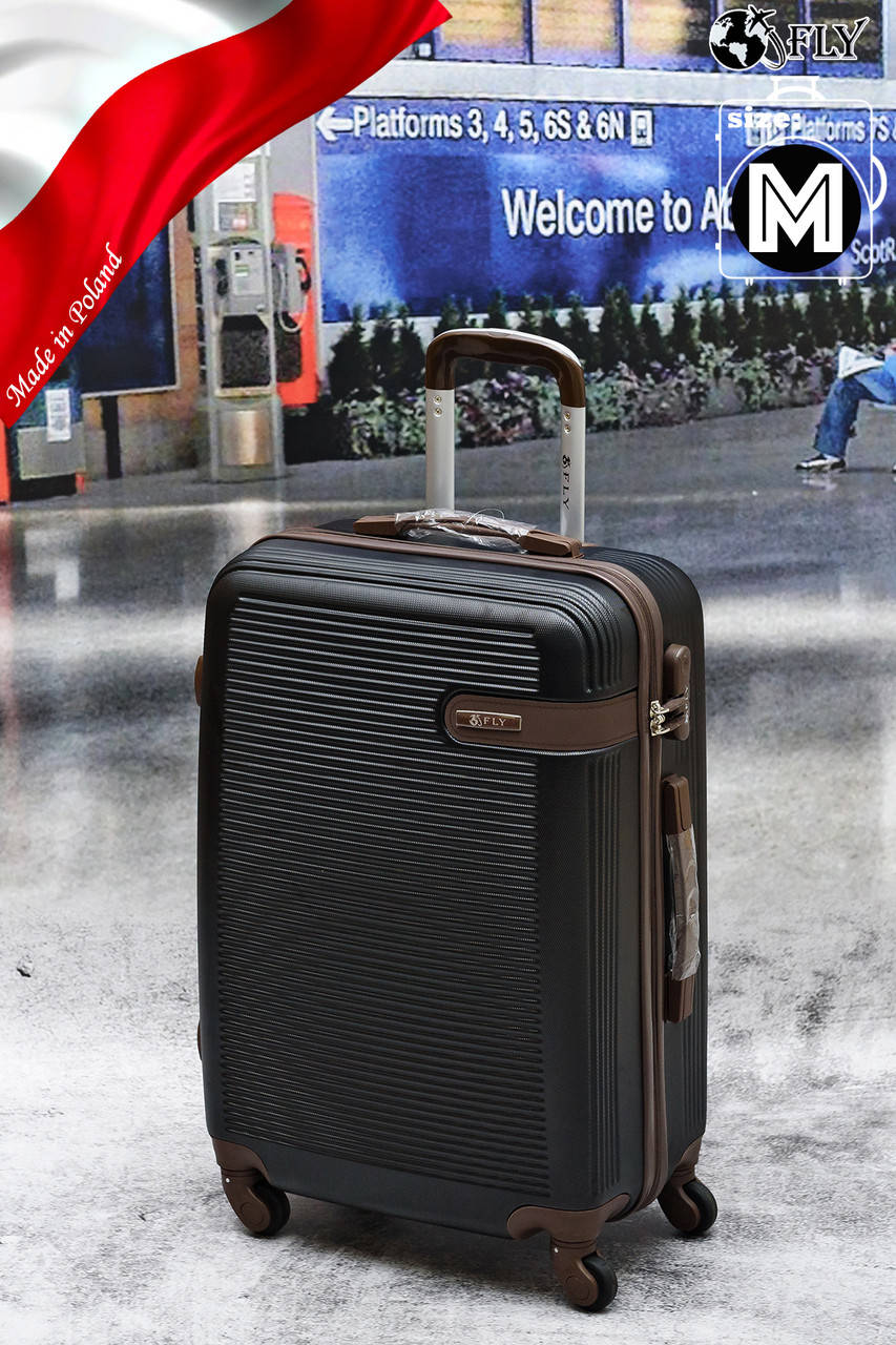 

Чемодан Fly 1101 M Luggage  на 4 колесах Польша, Черный