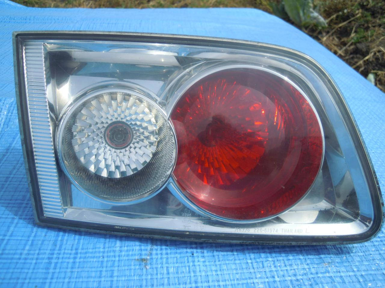 

Фонарь крышки багажника левый Mazda 6 GY 2002-2007г.в.