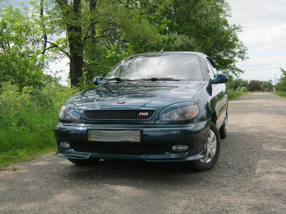 

Реснички на фары Daewoo Lanos, Sens Широкие (стеклопластик, под покраску), Черный