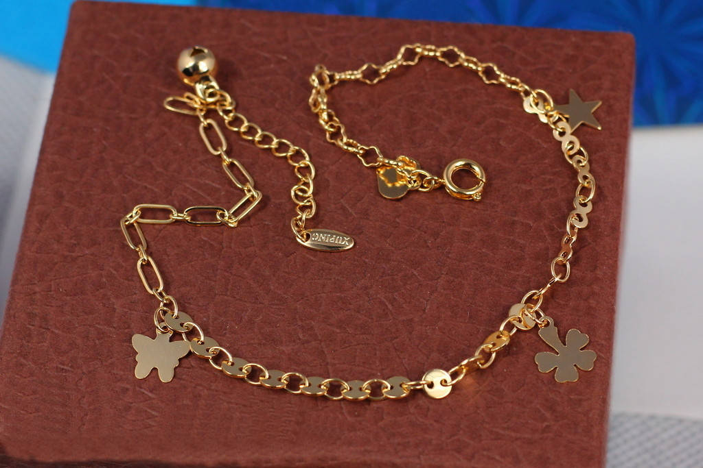 

Браслет Xuping Jewelry на ногу звездочка и цветочки 25 см 2 мм добавка цепи 2.5 см золотистый