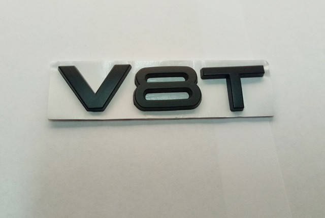 

Шильдик надпись V8T черный на крыло