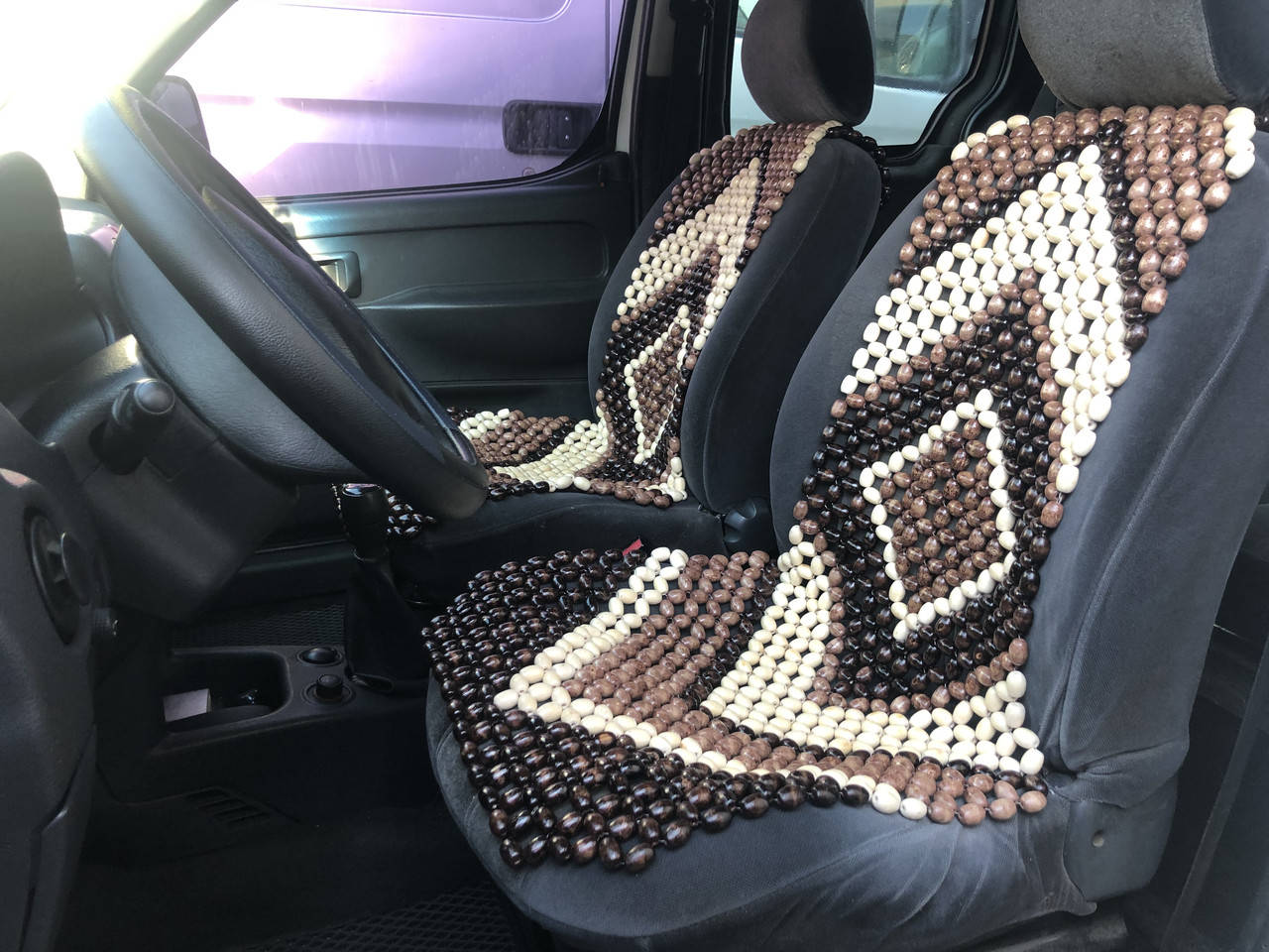 

Деревянная автомассажная накидка на сиденье автомобиля.