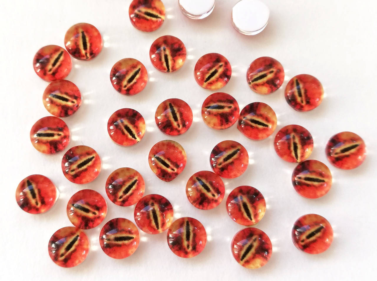 

Очі для іграшок 6 мм акрилові. Для приклеювання.Без отворів для пришивання