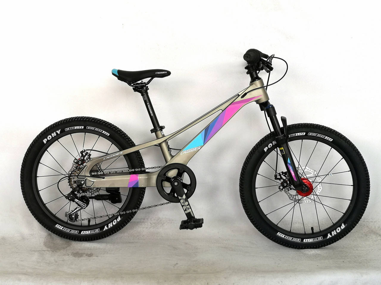 

Велосипед Crosser XMB 20 дюймов магний Shimano ( рама 10", 7S) серо-радужный, Серый