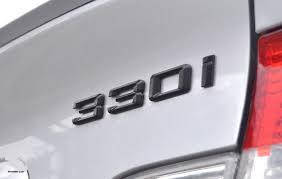 

Эмблема надпись багажника BMW 330i чёрная